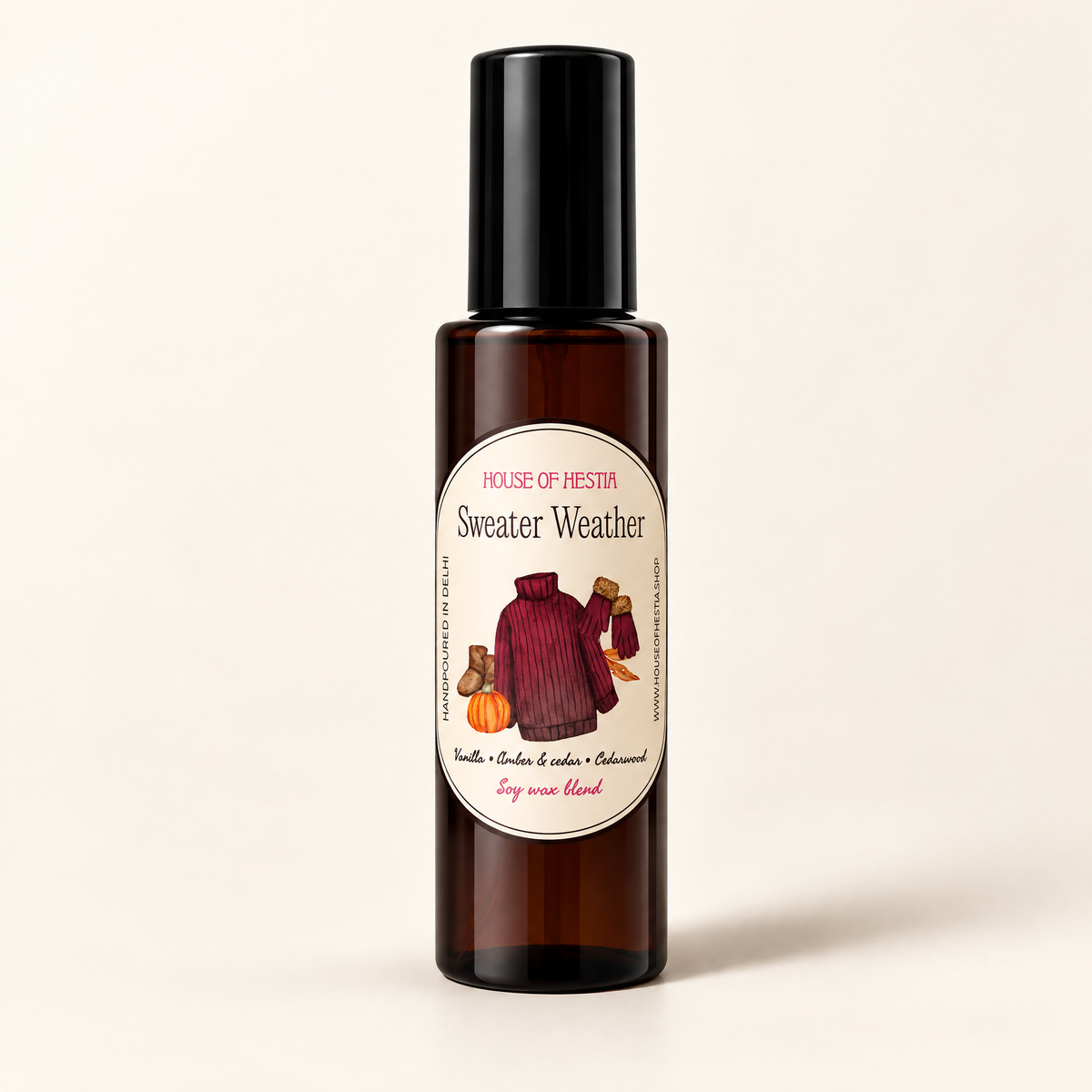 Sweater Weather linen mist by House of Hestia in an amber bottle