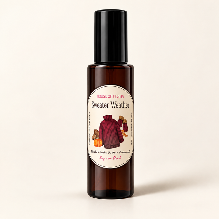 Sweater Weather linen mist by House of Hestia in an amber bottle
