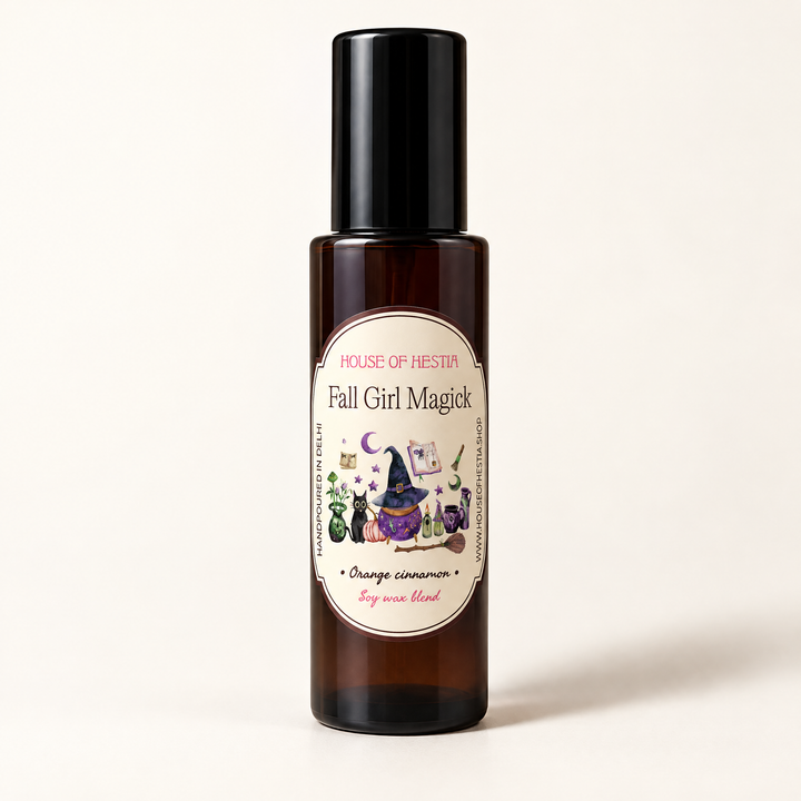 Fall Girl Magick linen mist by House of Hestia in an amber bottle