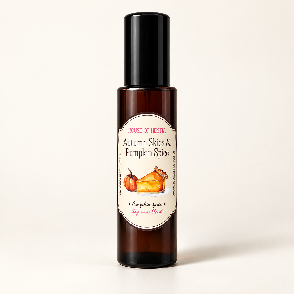 Autumn Skies & Pumpkin Spice linen mist by House of Hestia in an amber bottle