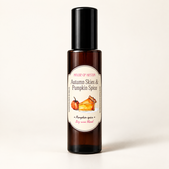 Autumn Skies & Pumpkin Spice linen mist by House of Hestia in an amber bottle